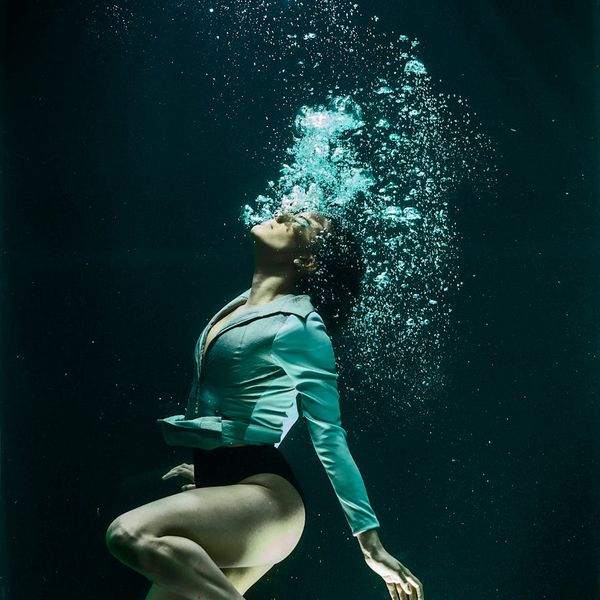 A person in a fluid motion yoga pose.